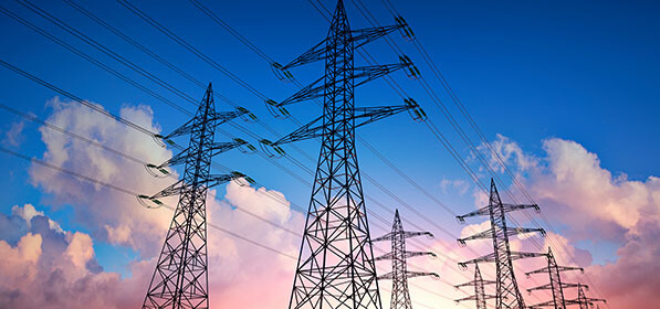 Power lines against beautiful sky